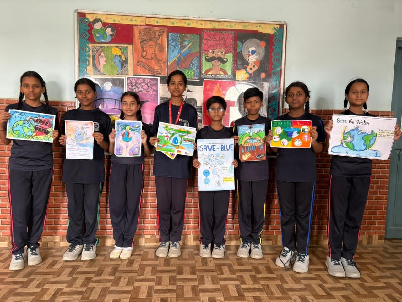 Udaya Public School students displaying their water conservation posters during the Jal Shakti Abhiyaan campaign